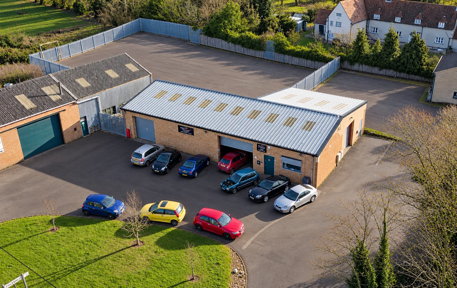 Aerial view of the Auto Sportivo workshop and forecourt on Colesden Road, Bedford